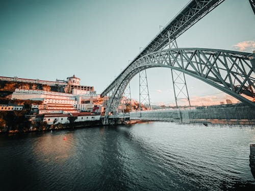 Kostenloses Stock Foto zu aufnahme von unten, bogenbrücke, dom luis i