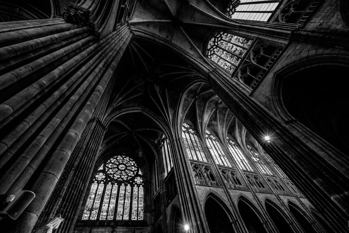 Grayscale Photography of Cathedral Ceiling