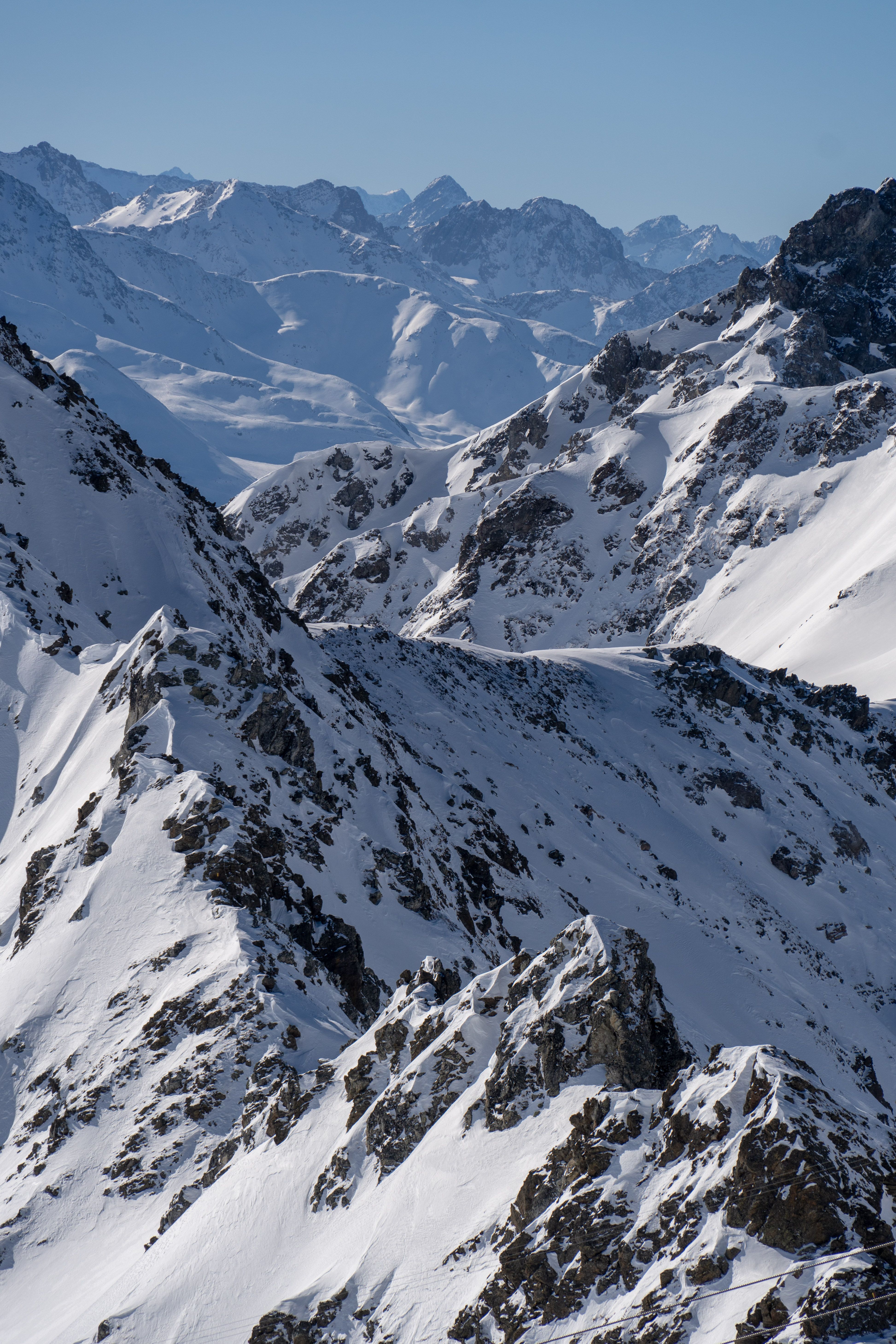 An Aerial Photography of a Snow Covered Mountain · Free Stock Photo