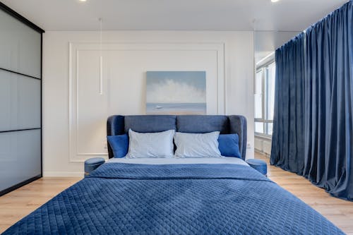 Modern Bedroom with Mirror on Wall