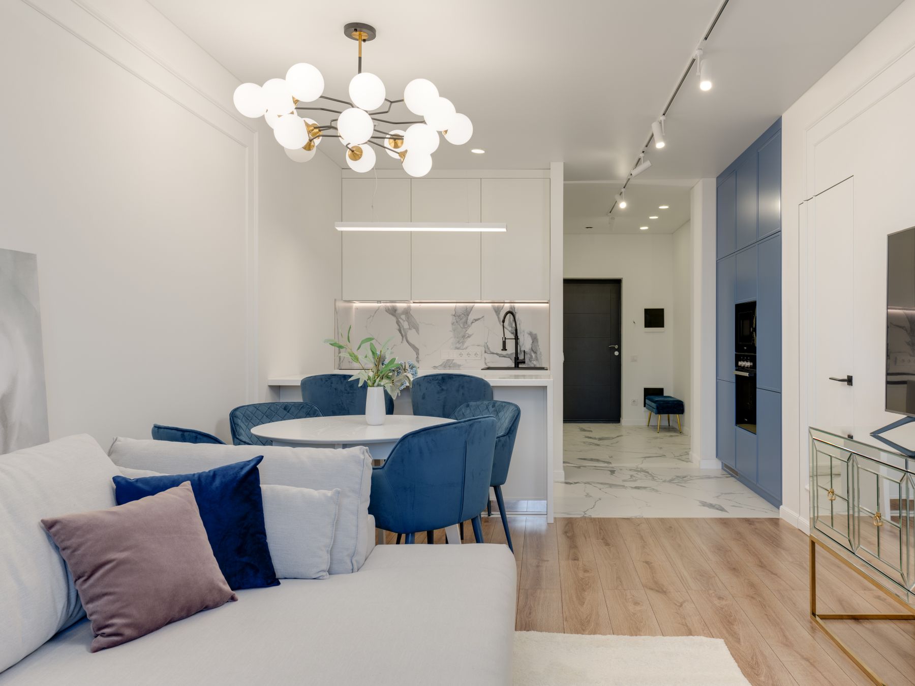 Charing Cross — movers delivering furniture from a van