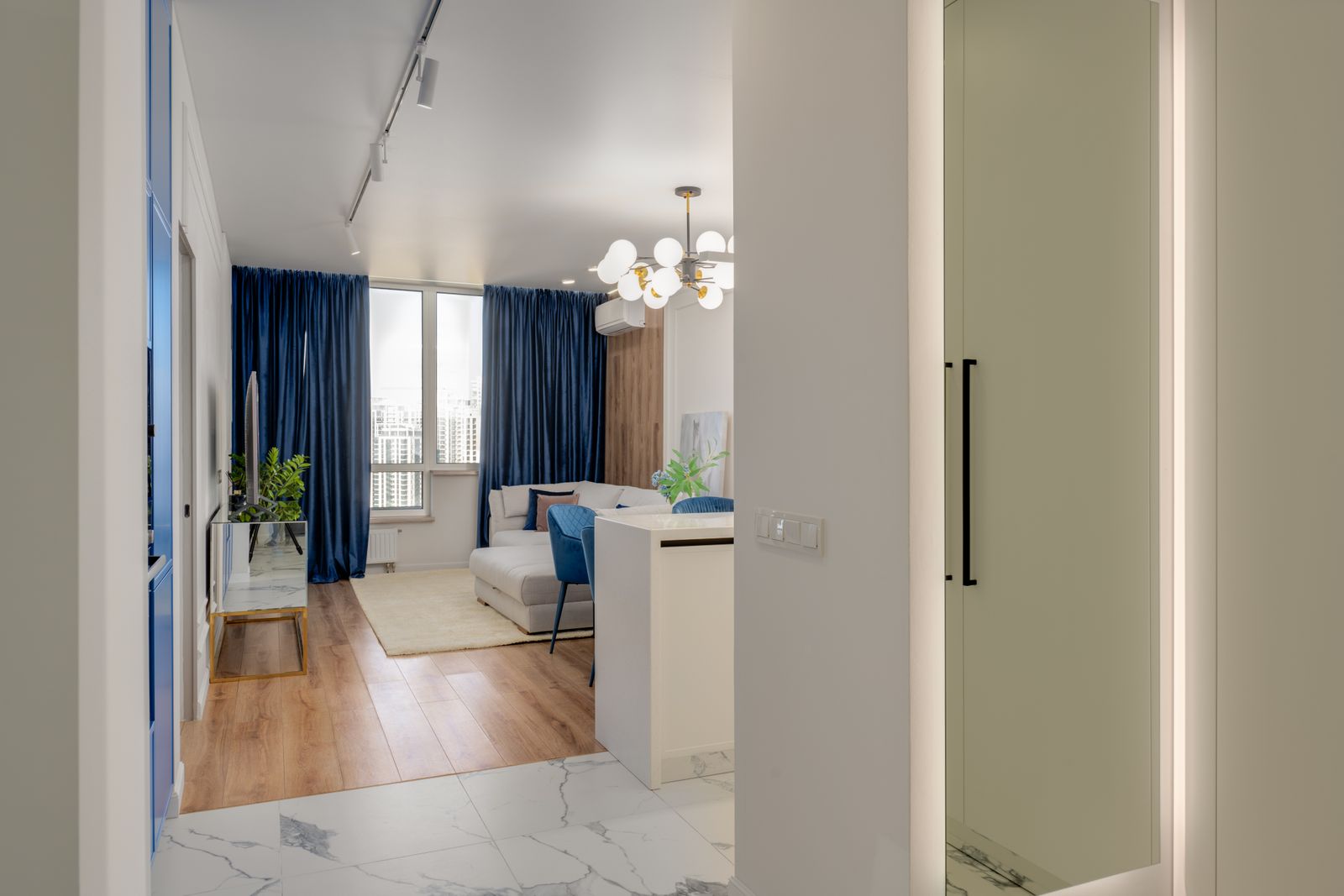 Contemporary room with layered curtains