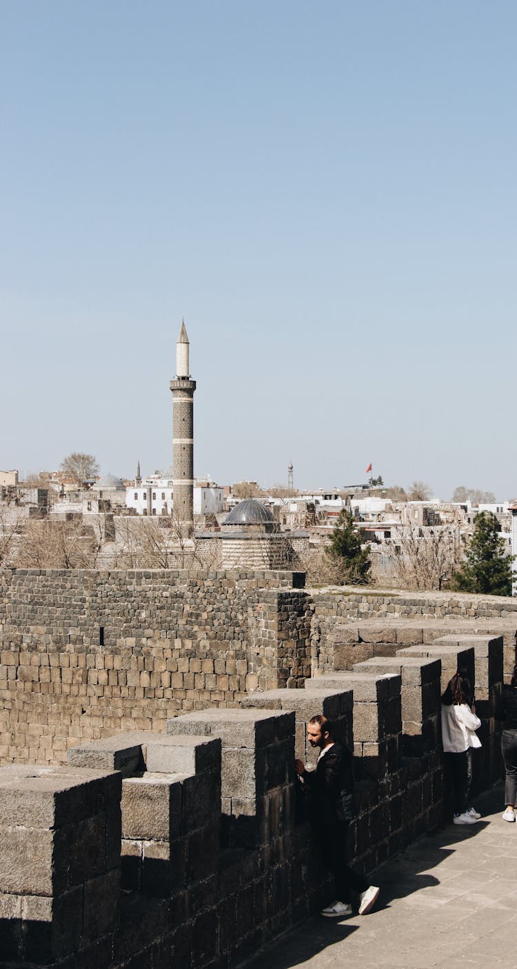 View Of Minaret And Historical Defensive Walls