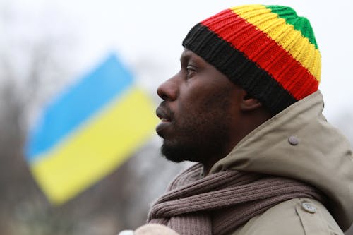 Man in a Multicolored Knitted Cap