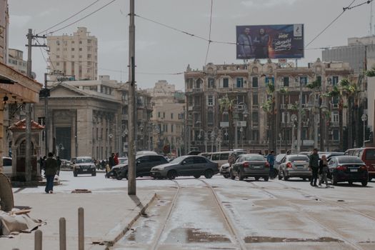 A Cars on the Road Near the Buildings