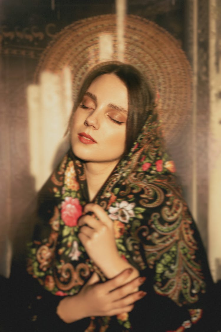 Photo Of Young Woman In Kerchief On Head Pretending Saint 