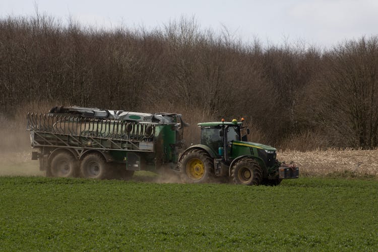 John Deere Tractor Towing A  Slurry Tanker