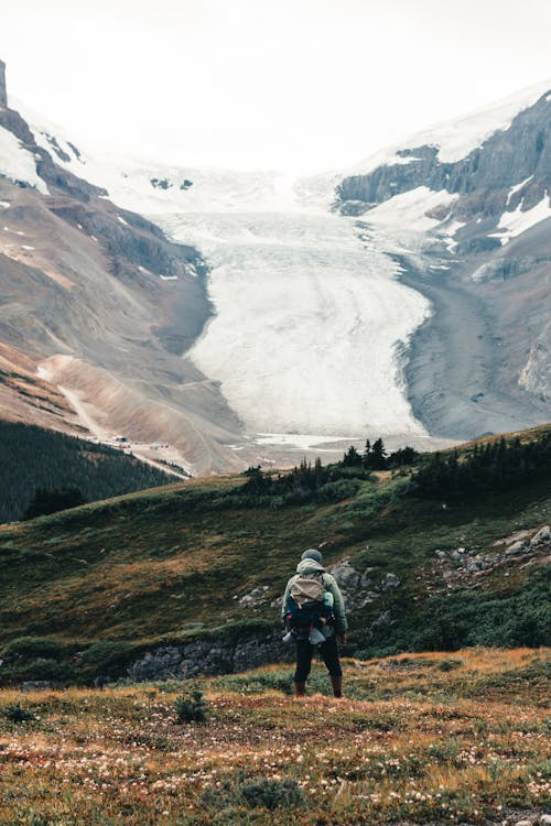Hiker Looking at Glacier
