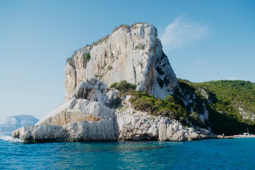 Free Captivating coastal landscape featuring a rugged rock formation in Sardinia, Italy. Stock Photo