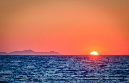 Serene sunset over the ocean off the coast of Bodrum, Turkey.