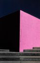 A Black and Pink Concrete Wall