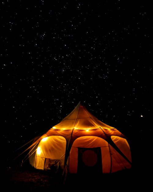 Free A Tent Under the Starry Sky at Night Stock Photo