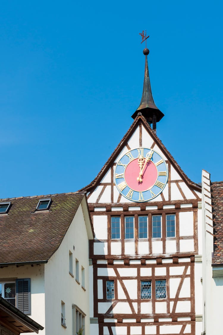 A Clock On A Tenement House In Old Town Of Stein Am Rhein, Canton Of Schaffhausen, Switzerland