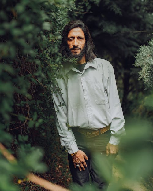 Bearded Man Wearing a Gray Long Sleeve Shirt