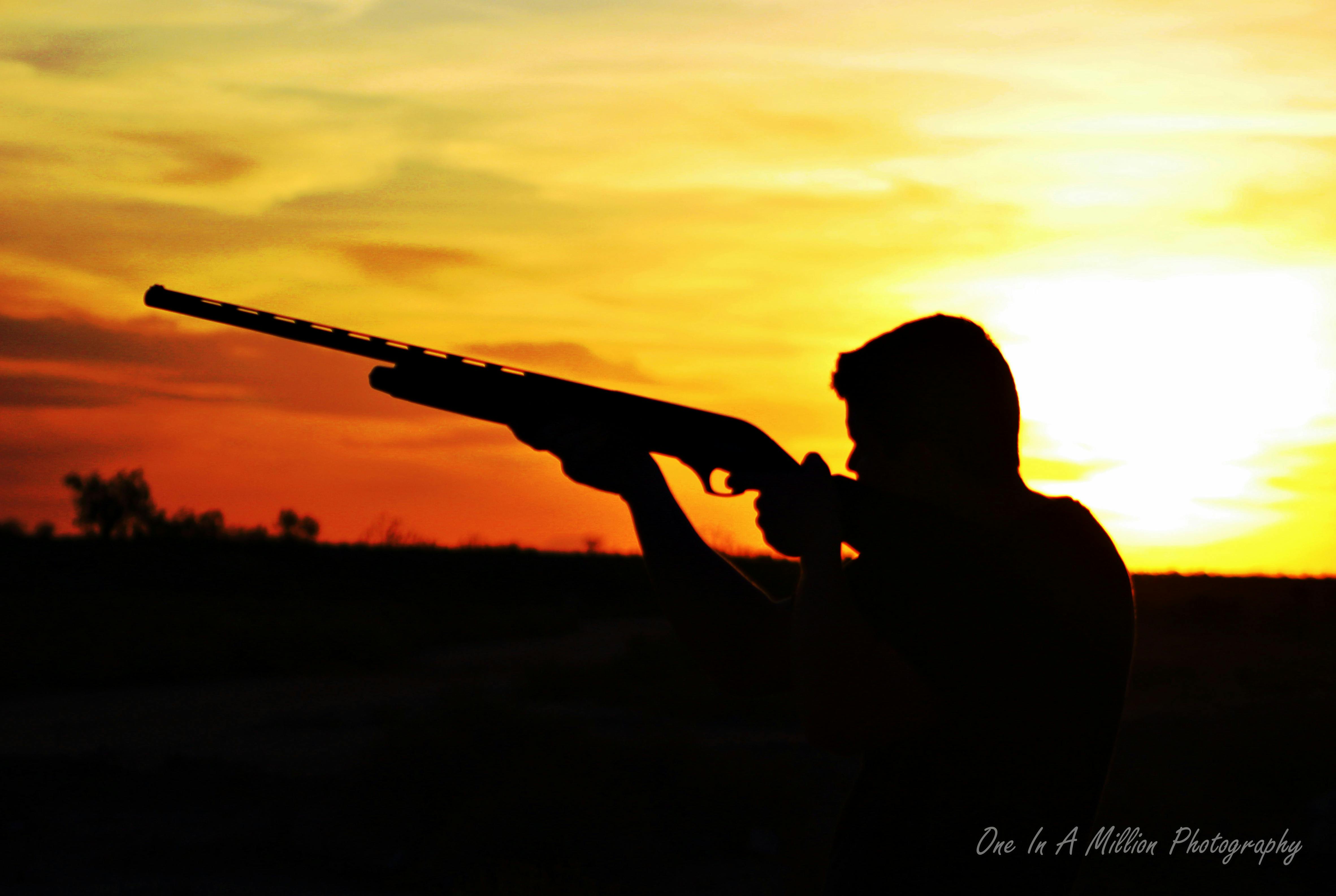 Free stock photo of gun, silhouette, sunset
