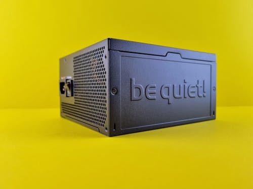 Computer Power Supply on Yellow Surface