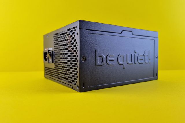 Power supply unit Computer power supply unit on a yellow surface