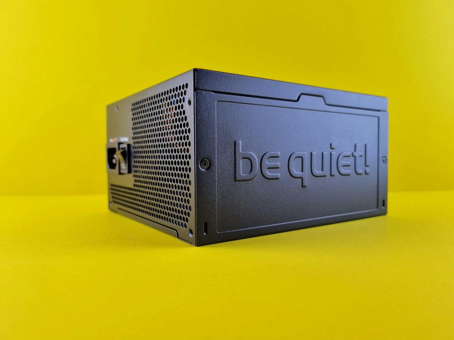 Sleek power supply unit with 'be quiet' branding. Perfect for electronics or tech retail stock.