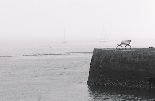 Bench on a Breakwater on Seaside