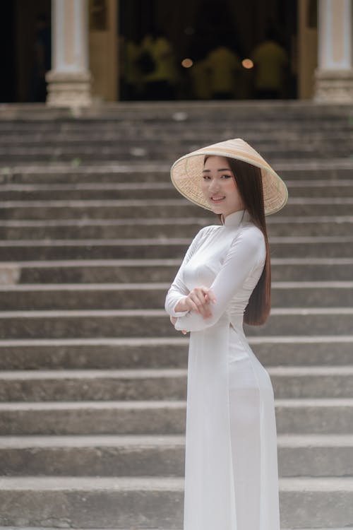 Beautiful Woman in White Traditional Clothing