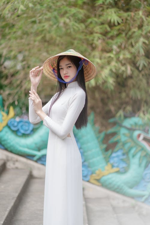 Gratis arkivbilde med ao dai, asiatisk kvinne, chapéucònicasiatisk