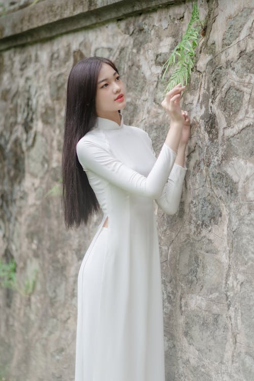 Woman in White Long Sleeve Dress 