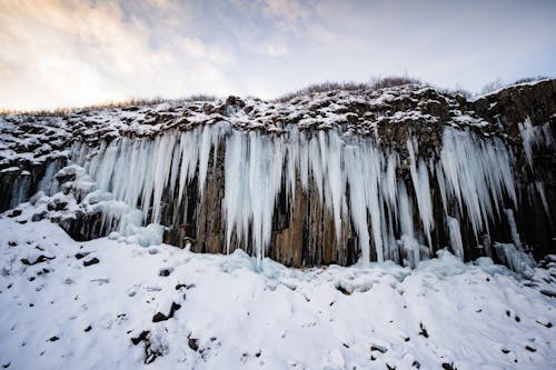Icicles on the Rock in the Mountains 