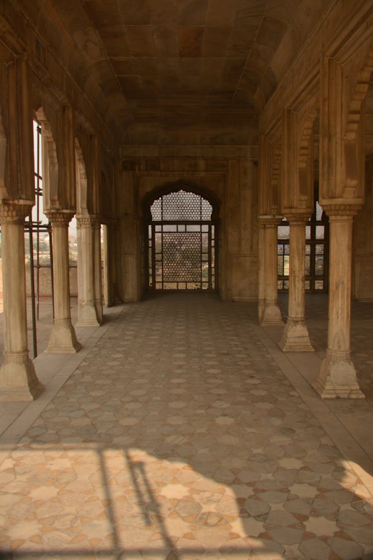 Hallway In Old Stone Building With Columns