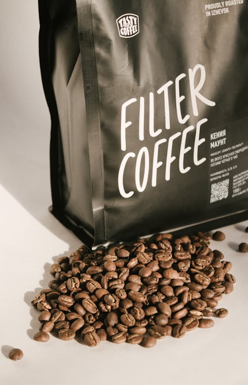 Free Coffee Beans on White Surface Stock Photo