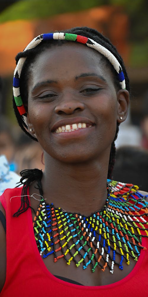 Close-Up Shot of a Woman Wearing Zulu Beaded Necklace