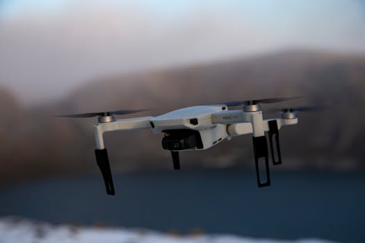Close-up of a drone flying above a peaceful lake setting during twilight, showcasing modern technology.