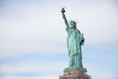Free Statue of Liberty Under Cloudy Sky Stock Photo