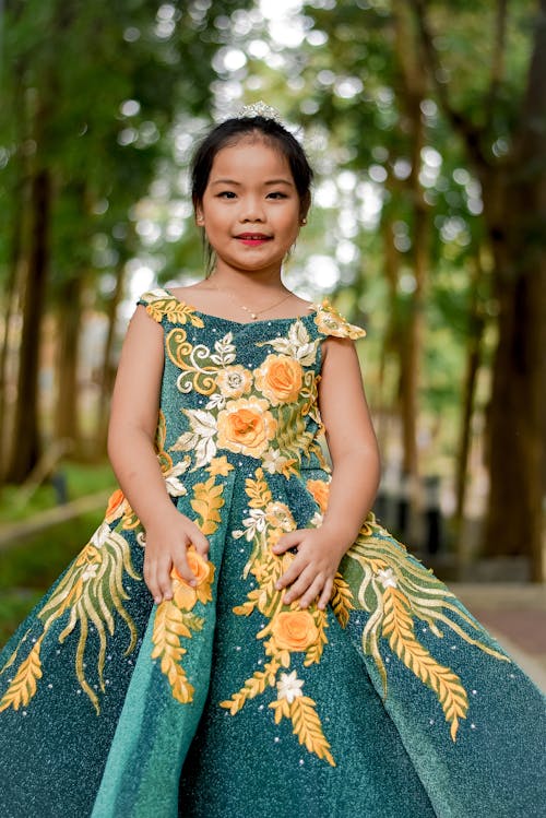 Photo of a Kid Wearing a Gown