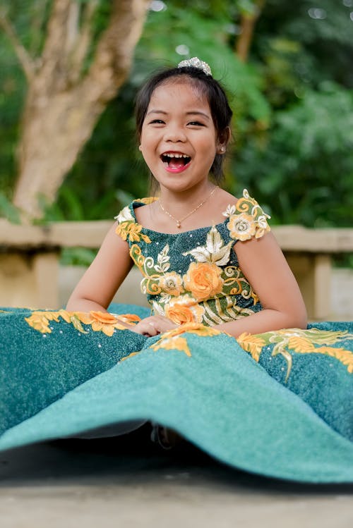 Free Happy Girl Wearing a Gown Stock Photo