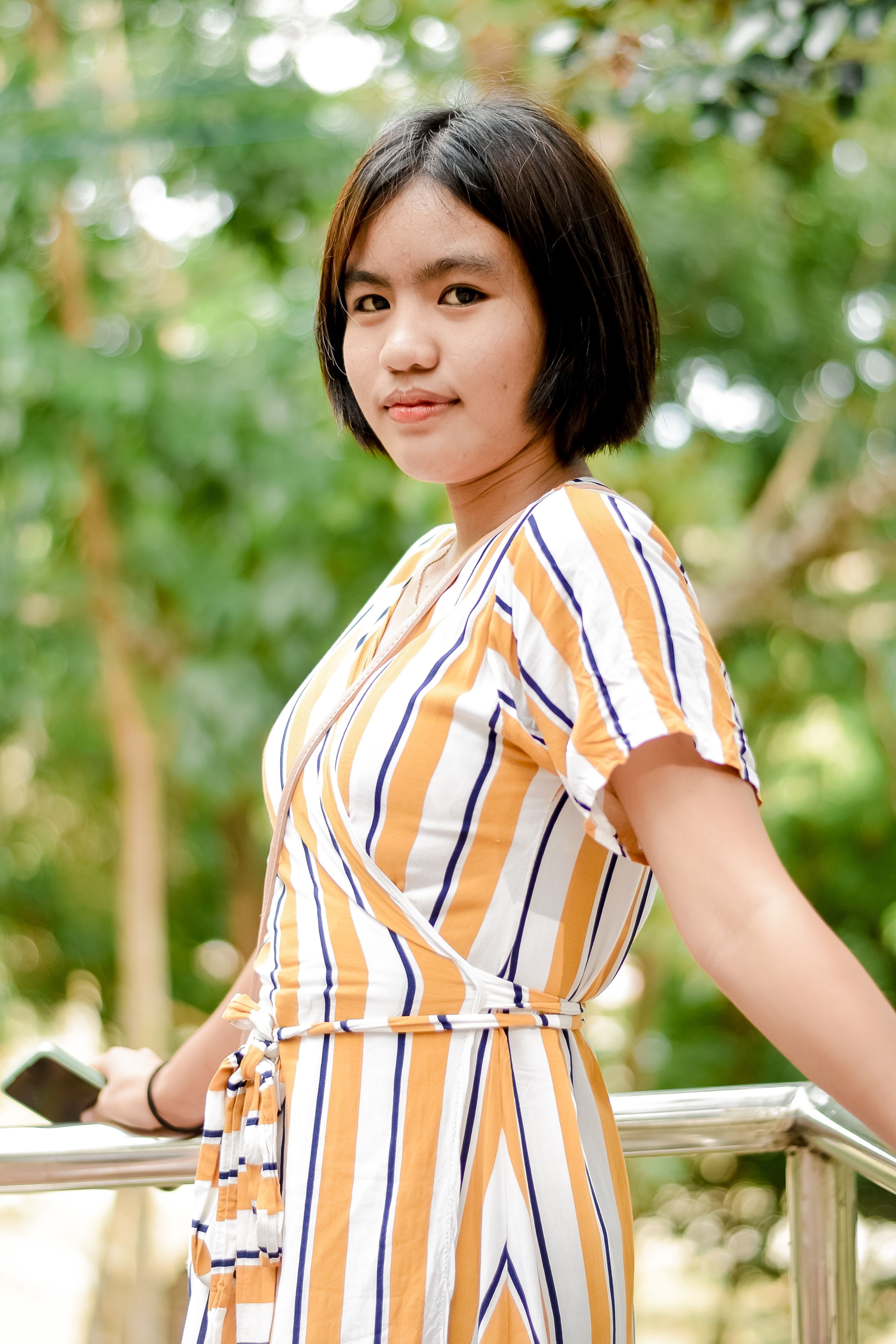 Woman in Striped Dress · Free Stock Photo