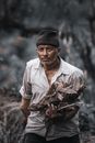 Man in Dirty Clothes Doing Physical Work