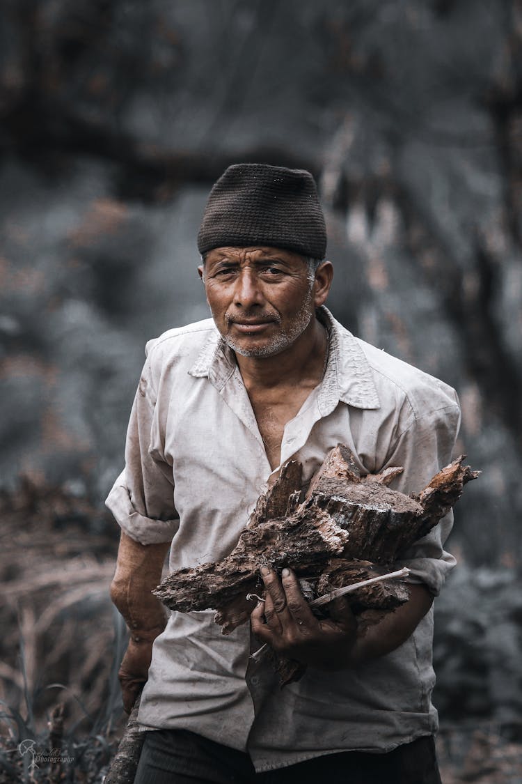 Man In Dirty Clothes Doing Physical Work