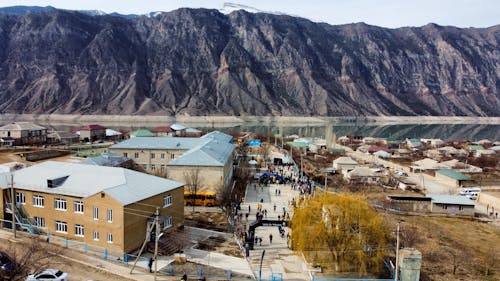 Houses near Lake and Mountain