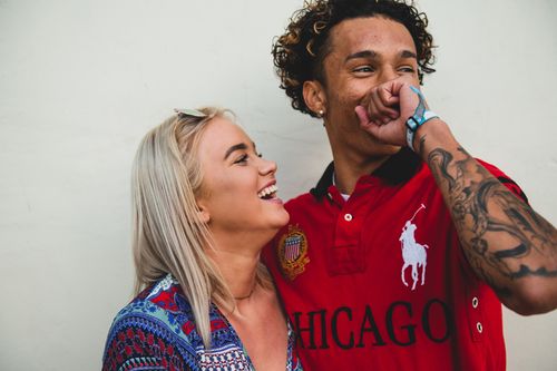 Romania dating site free – couple laughing together outdoors