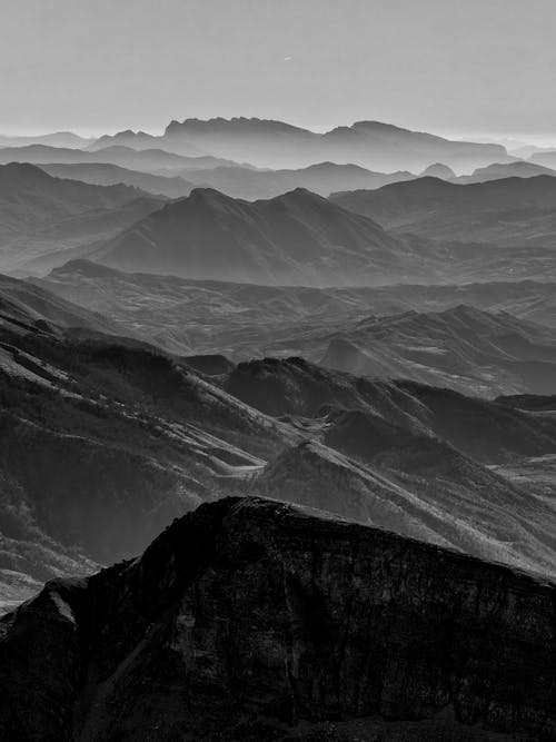 Grayscale Photo of Mountains