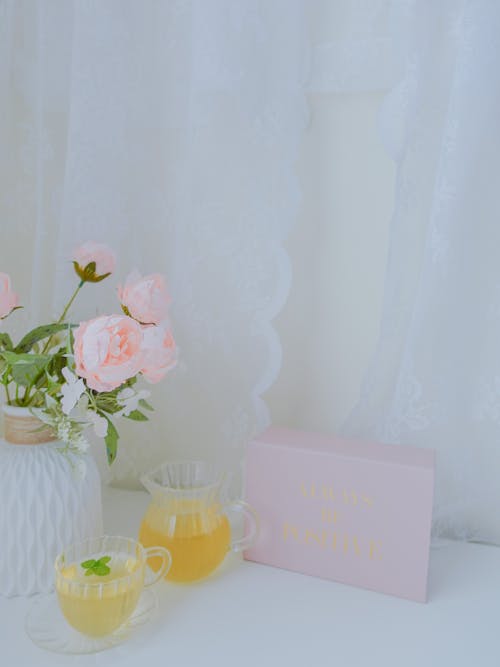 Pink Peony Flowers in a White Vase