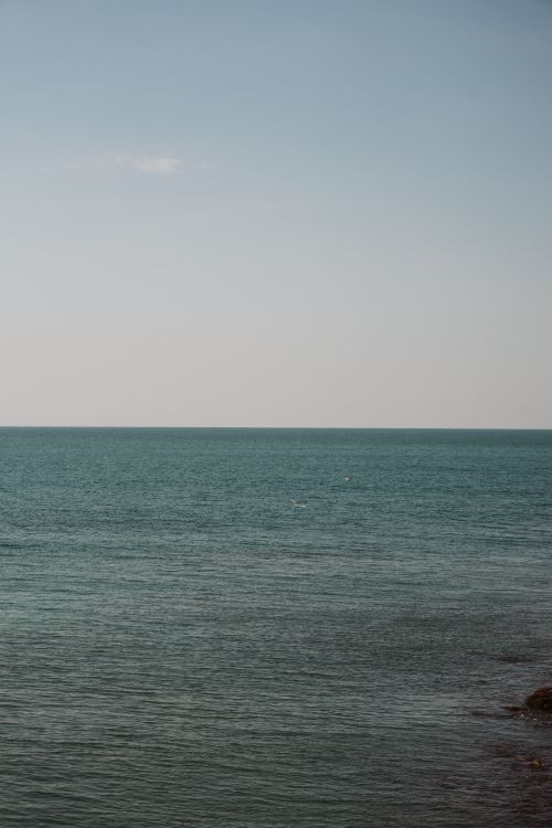 Free Tranquil view of the Atlantic Ocean at Biarritz, France on a clear day. Perfect for relaxation themes. Stock Photo
