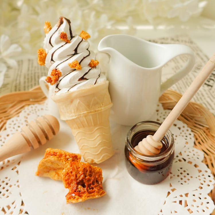 Close-Up Shot of a Ice Cream and Honey