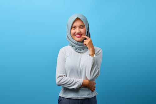 Foto d'estoc gratuïta de adolescent, hijab, musulmà