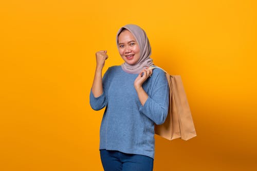 Woman Holding Paper Bags