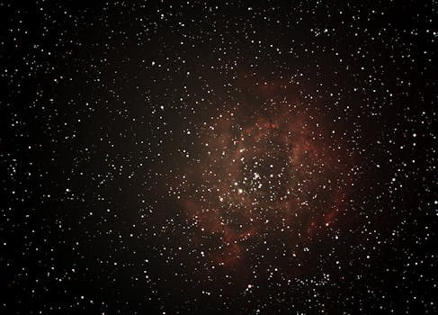 Stunning capture of the Rosette Nebula surrounded by stars in the deep cosmos.