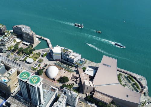 Aerial View of City Buildings Near Body of Water