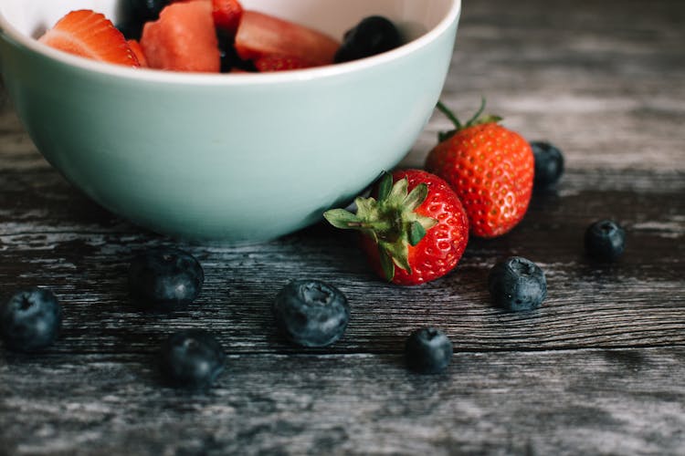 Strawberry Fruits And White Ceramic Bowl