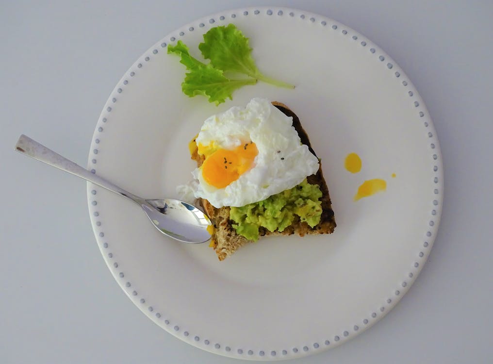 Free A Close-Up Shot of an Avocado Toast with Egg Stock Photo