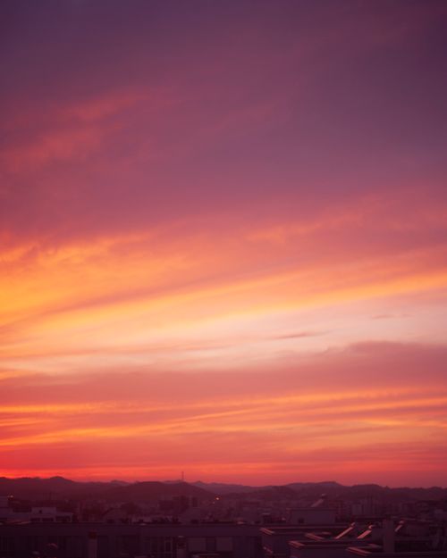 Free Capture the vivid hues of a stunning sunset over Tirana, Albania. Stock Photo